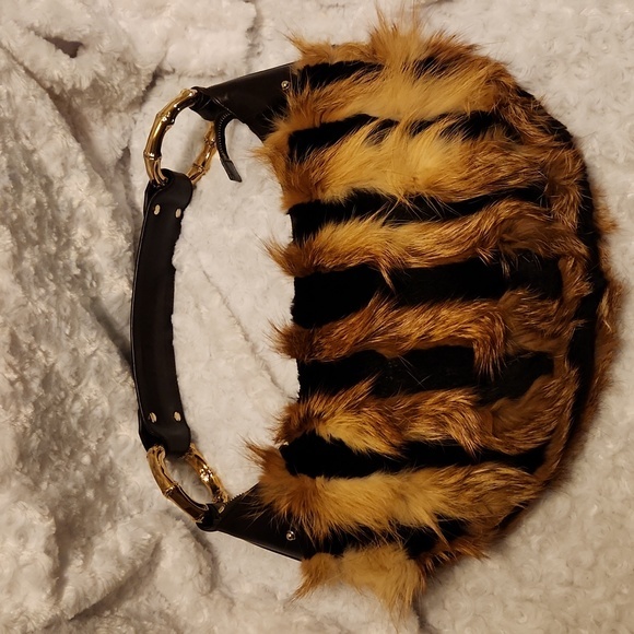 Gucci Handbags - Gucci fox fur gold bamboo leather bag